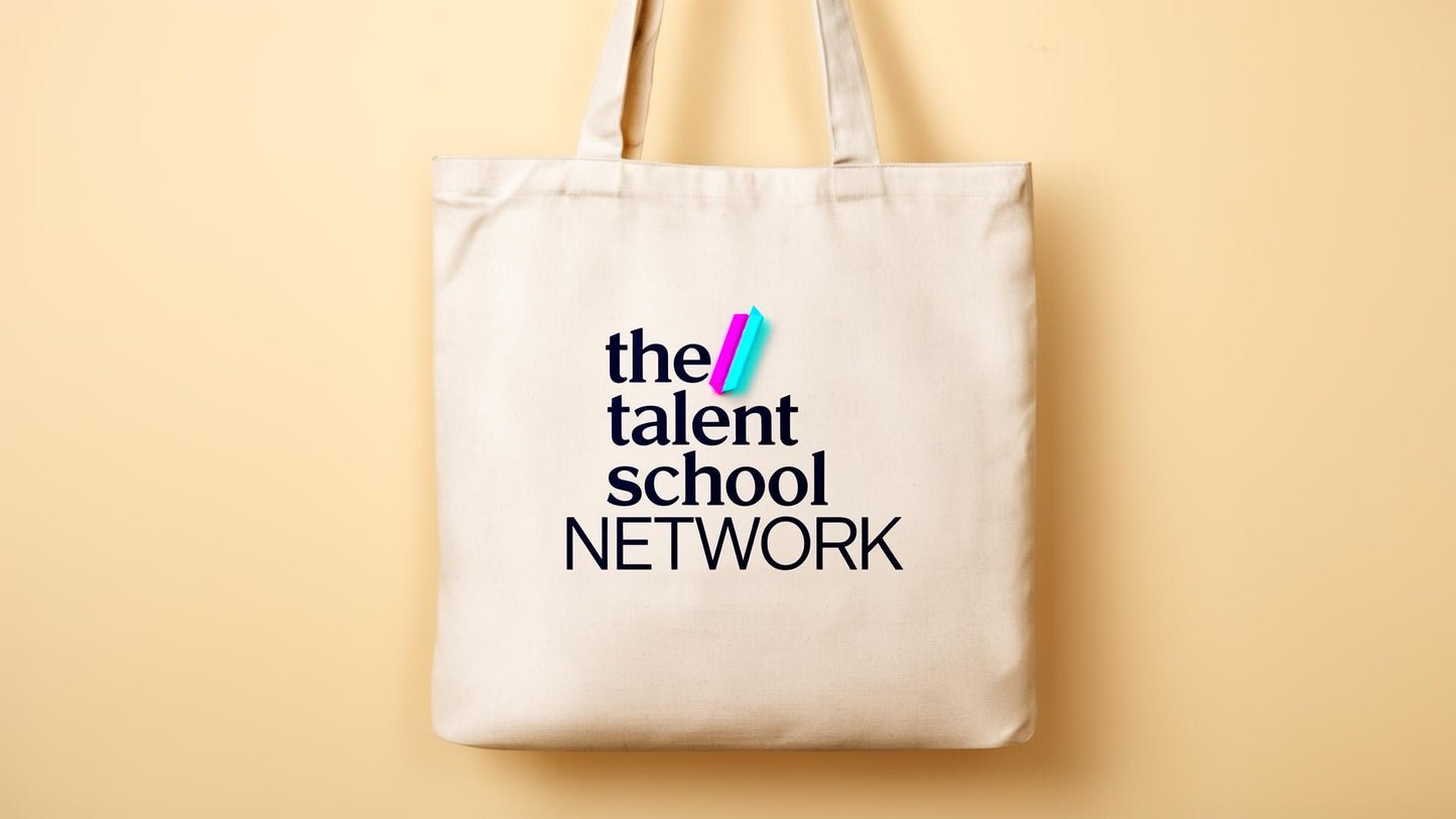 Wordmark Tote — cream canvas tote with stacked TSN wordmark